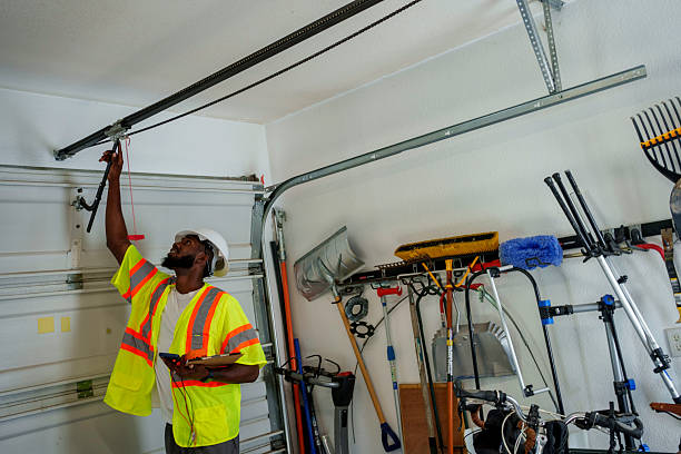 Professional Garage Door Installation technician working in Hutchinson, KS